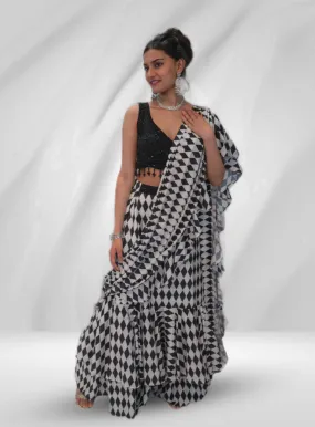 Black Embroidered Blouse With Layered Black And White Saree - Rent