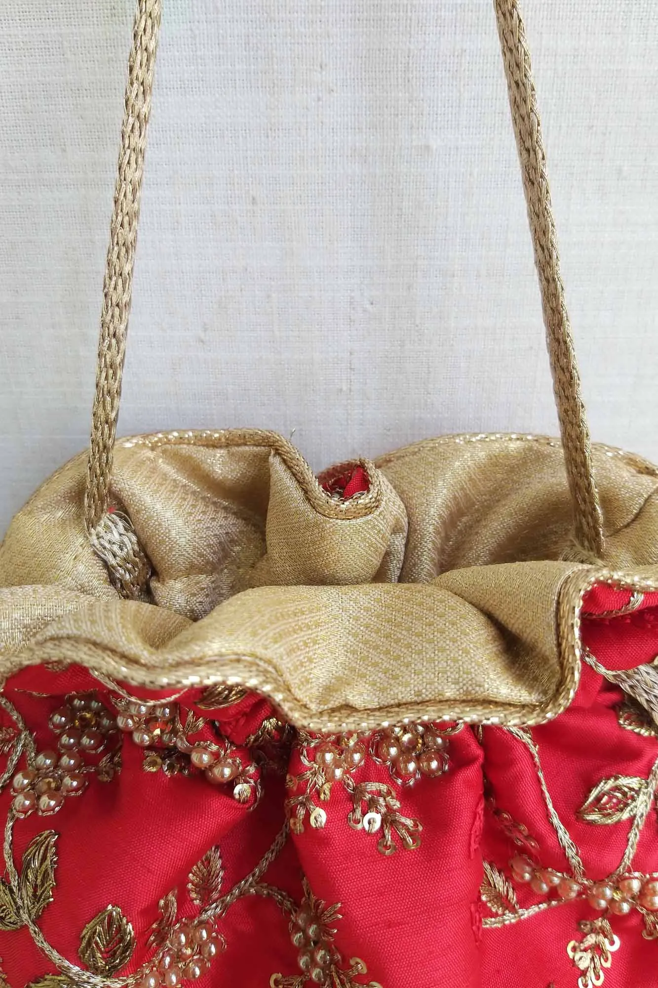 Red Embroidered Pearl Potli bag