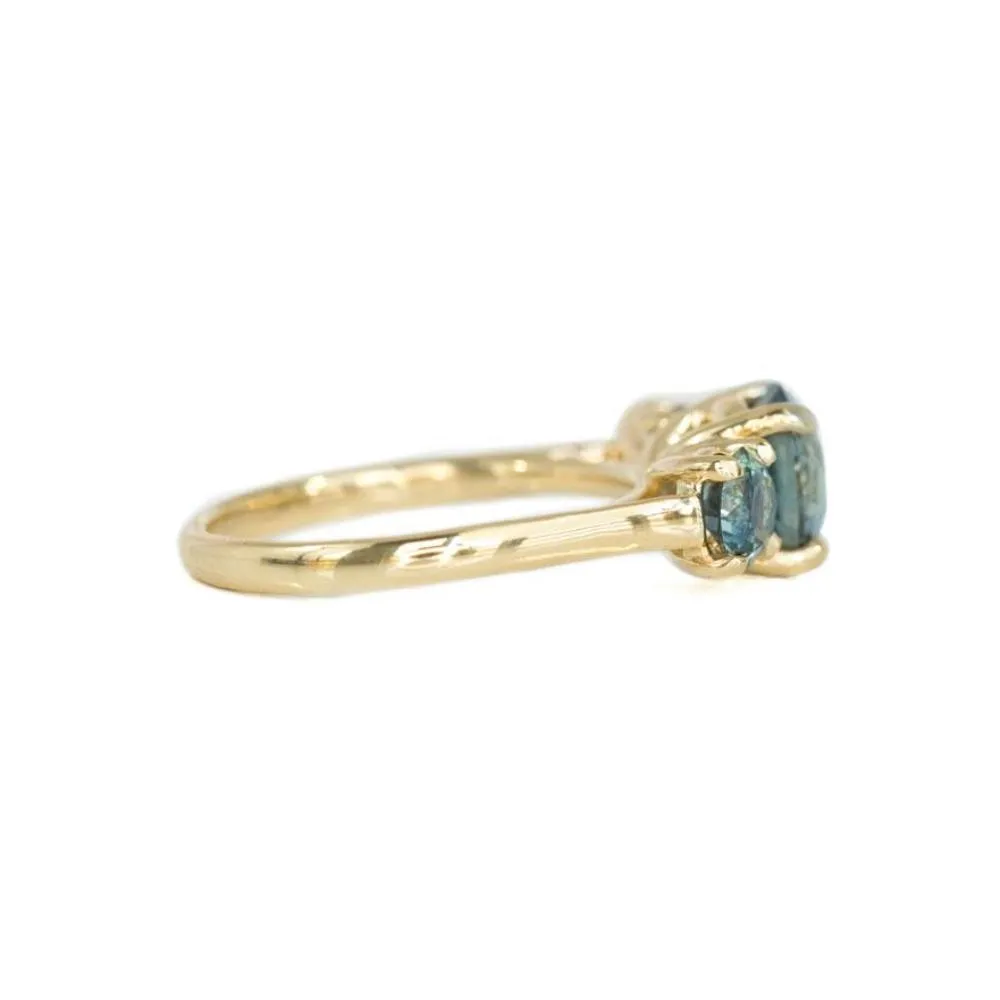 Three Stone Montana Sapphire Ring with 2.10ct Teal Color-Changing Center Stone in 14k Yellow Gold